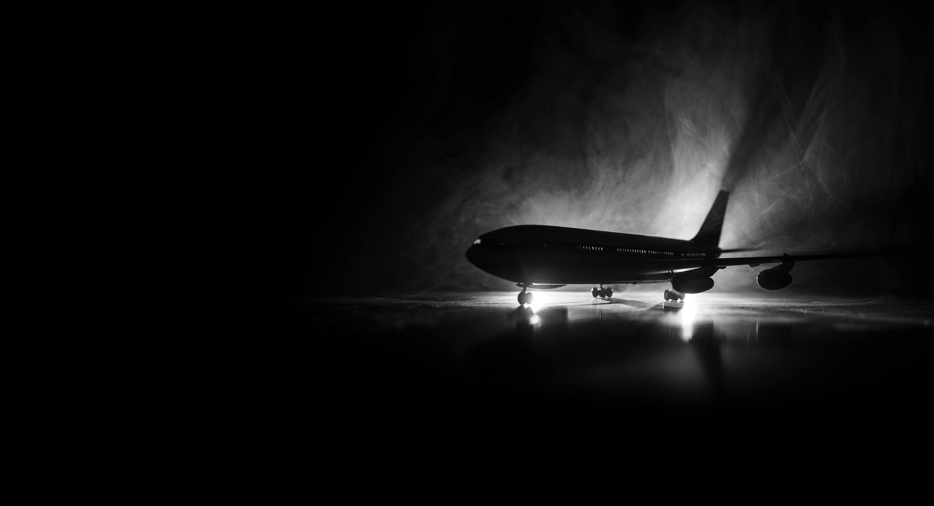 Cargo aircraft on a dark runway